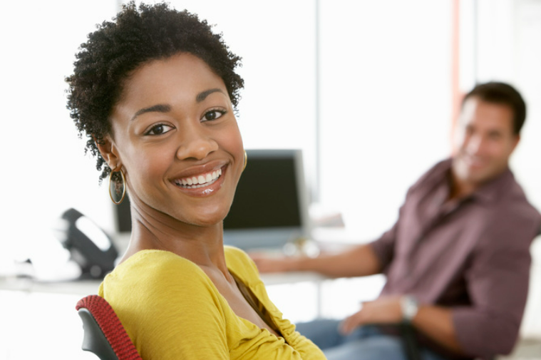 happy woman after a resume coaching session