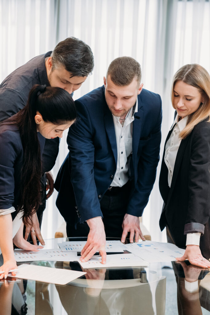 Business,Briefing.,Leadership.,Boss,Talking,To,His,Team,In,Board