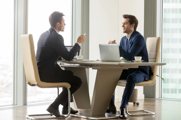 career coach prepping a client for an interview in Atlanta