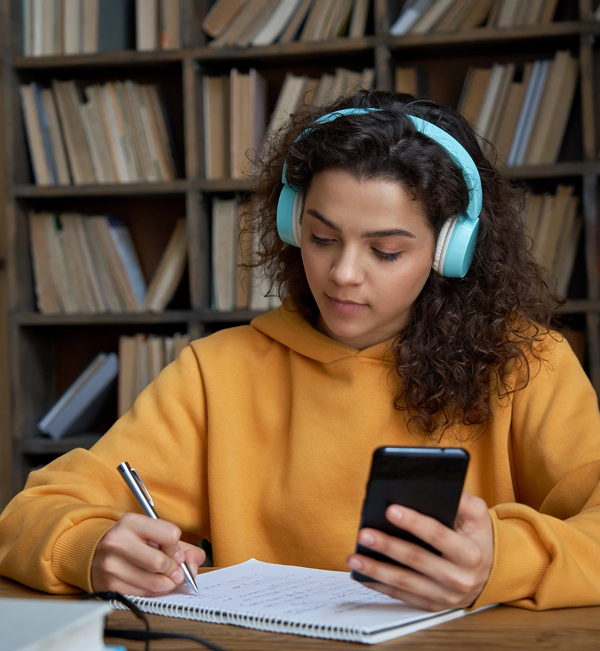 Female student studying in college library