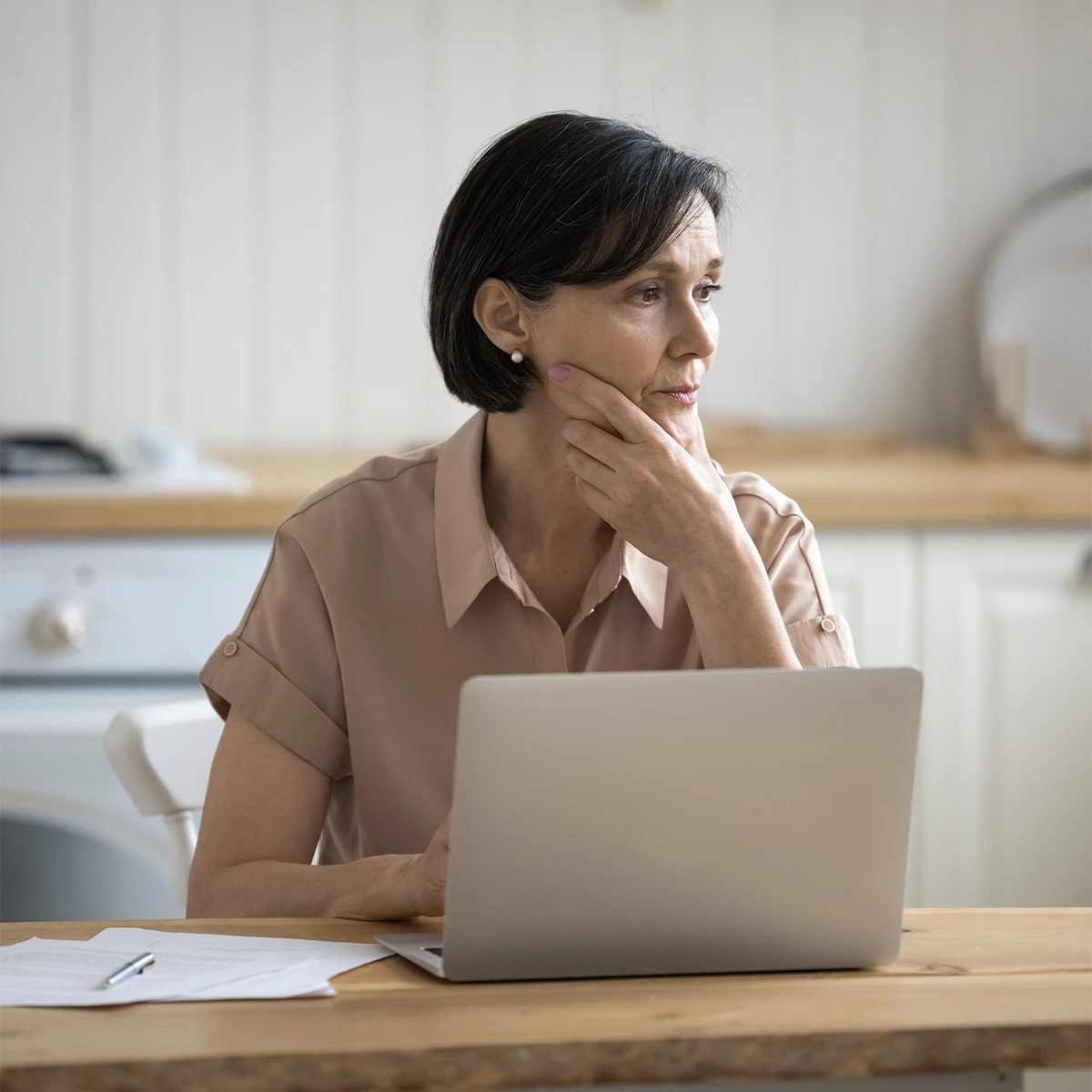 Business professionals reviewing reports to make decisions